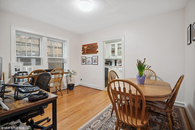 2017 W Farragut Ave Unit 1, Chicago, IL 60625 - dining space featuring light wood finished floors and an office area