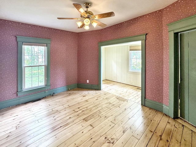 1204 W Reynolds St, Pontiac, IL 61764 - spare room with plenty of natural light, wood-type flooring, and ceiling fan
