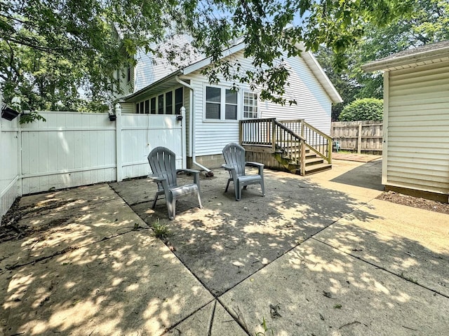 1204 W Reynolds St, Pontiac, IL 61764 - fenced backyard featuring a patio