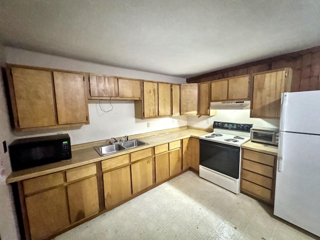 1204 W Reynolds St, Pontiac, IL 61764 - kitchen featuring freestanding refrigerator, electric stove, under cabinet range hood, a sink, and black microwave