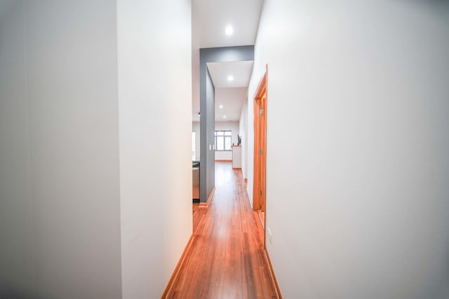 4770 N Manor Ave Unit 405, Chicago, IL 60625 - hall featuring light wood-style flooring, recessed lighting, and baseboards