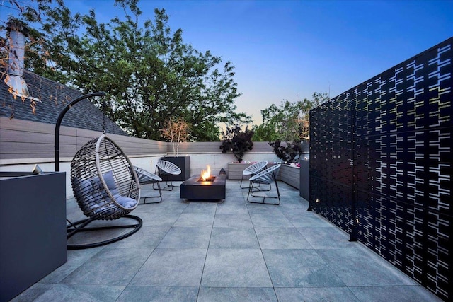 1332 W Wellington Ave, Chicago, IL 60657 - view of patio / terrace with a fire pit