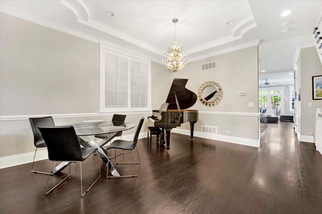 1332 W Wellington Ave, Chicago, IL 60657 - dining area featuring wood finished floors, crown molding, a raised ceiling, baseboards, and a chandelier
