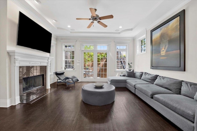 1332 W Wellington Ave, Chicago, IL 60657 - living room featuring wood finished floors, a premium fireplace, ceiling fan, a raised ceiling, and recessed lighting