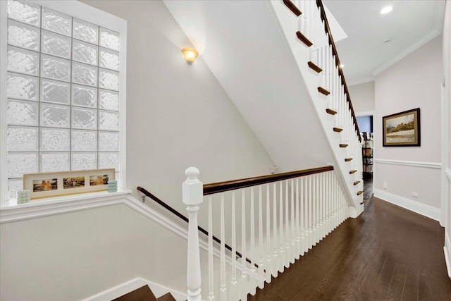 1332 W Wellington Ave, Chicago, IL 60657 - stairway with ornamental molding, wood finished floors, baseboards, and recessed lighting