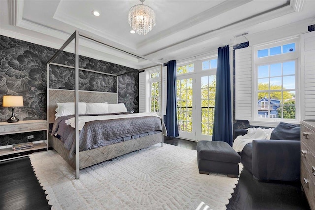 1332 W Wellington Ave, Chicago, IL 60657 - bedroom featuring a raised ceiling, crown molding, a chandelier, recessed lighting, and wood finished floors