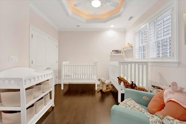 1332 W Wellington Ave, Chicago, IL 60657 - bedroom with crown molding, wood finished floors, a tray ceiling, recessed lighting, and a ceiling fan