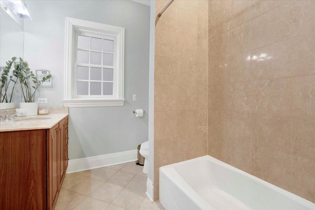 1332 W Wellington Ave, Chicago, IL 60657 - full bathroom with toilet, vanity, tile patterned floors, baseboards, and  shower combination
