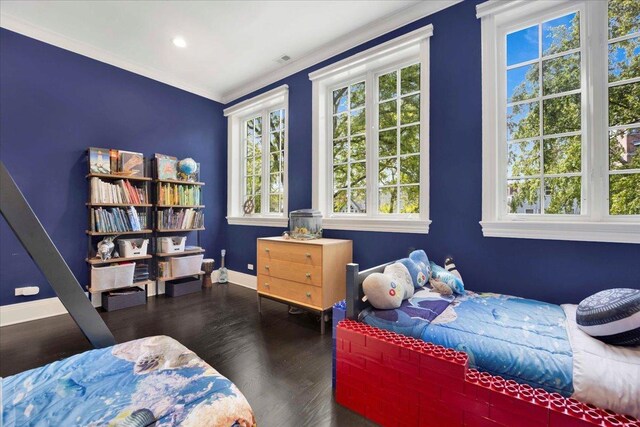 1332 W Wellington Ave, Chicago, IL 60657 - bedroom with multiple windows, wood finished floors, baseboards, ornamental molding, and recessed lighting
