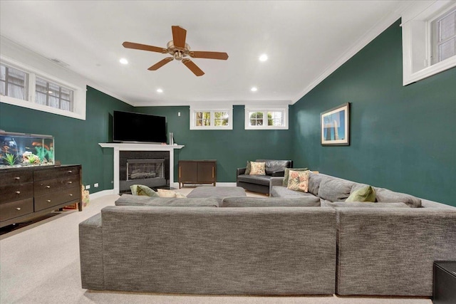 1332 W Wellington Ave, Chicago, IL 60657 - living room with ceiling fan, crown molding, a glass covered fireplace, recessed lighting, and carpet floors