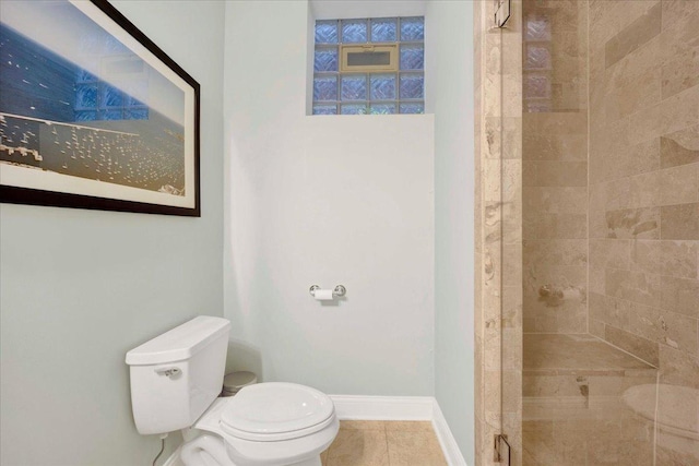 1332 W Wellington Ave, Chicago, IL 60657 - full bath featuring toilet, a stall shower, tile patterned flooring, and baseboards