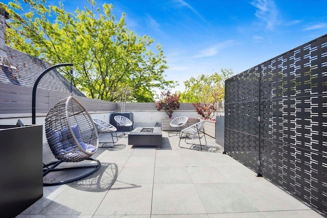1332 W Wellington Ave, Chicago, IL 60657 - view of patio / terrace featuring an outdoor fire pit
