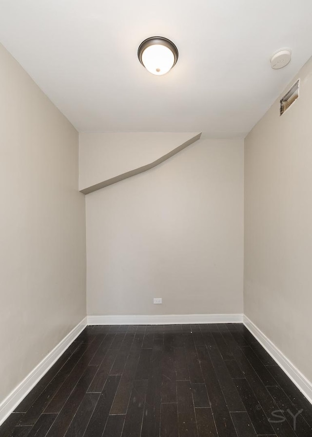 3651 W Grenshaw St, Chicago, IL 60624 - unfurnished room featuring dark wood finished floors, vaulted ceiling, and a smoke detector