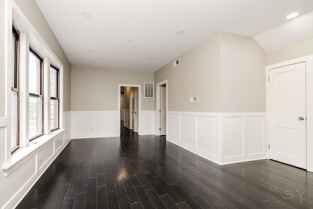 3651 W Grenshaw St, Chicago, IL 60624 - empty room with wainscoting and dark wood-style floors