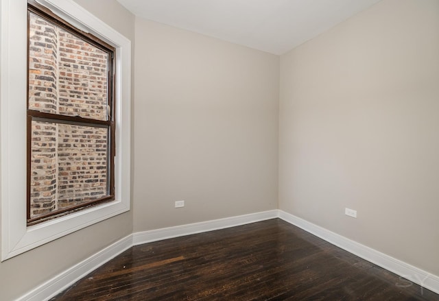 3651 W Grenshaw St, Chicago, IL 60624 - spare room featuring dark wood-type flooring