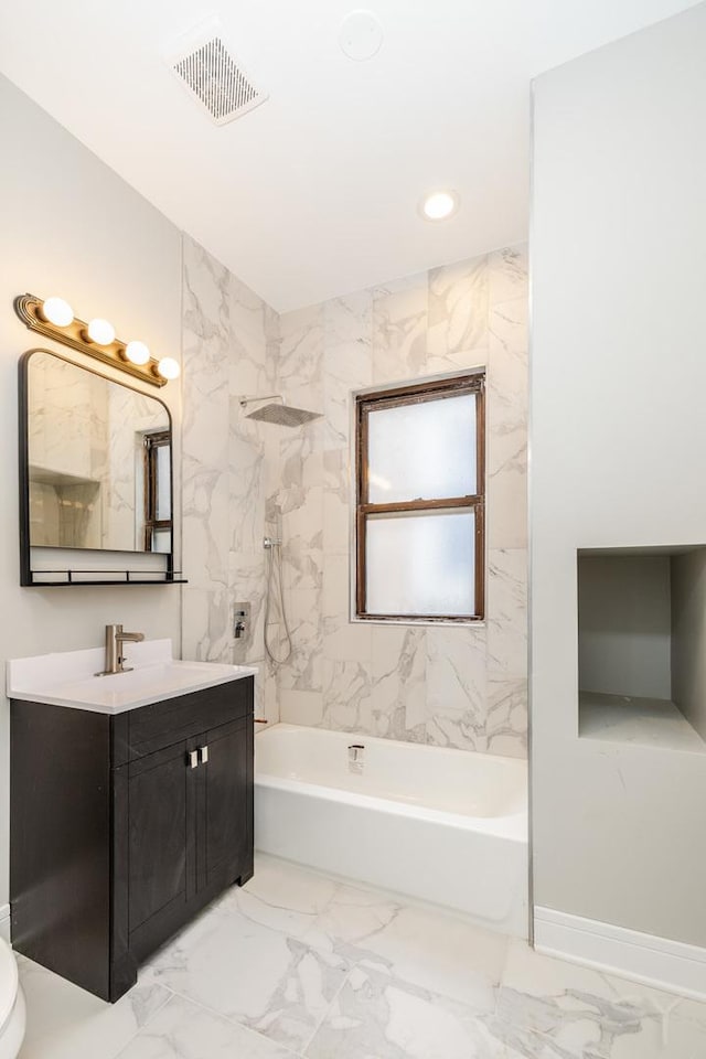 3651 W Grenshaw St, Chicago, IL 60624 - bathroom featuring vanity, marble finish floors, shower / tub combination, and recessed lighting