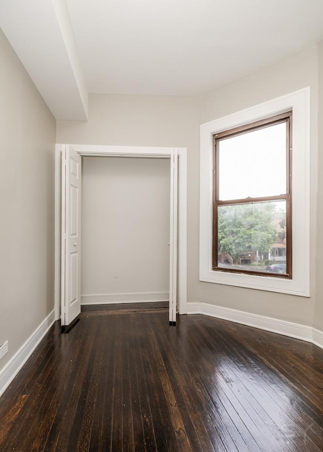 3651 W Grenshaw St, Chicago, IL 60624 - unfurnished bedroom with wood-type flooring and a closet