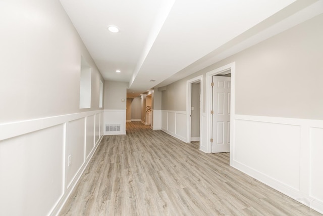 3651 W Grenshaw St, Chicago, IL 60624 - unfurnished room with light wood-style flooring, a wainscoted wall, a decorative wall, and recessed lighting