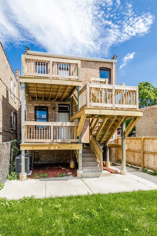 3651 W Grenshaw St, Chicago, IL 60624 - rear view of property with brick siding and stairs