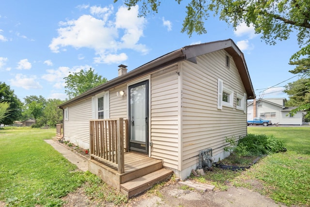 37714 N Nippersink Pl, Spring Grove, IL 60081 - view of home's exterior with a yard and a chimney