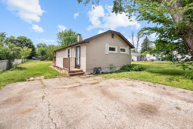 37714 N Nippersink Pl, Spring Grove, IL 60081 - rear view of house with a chimney