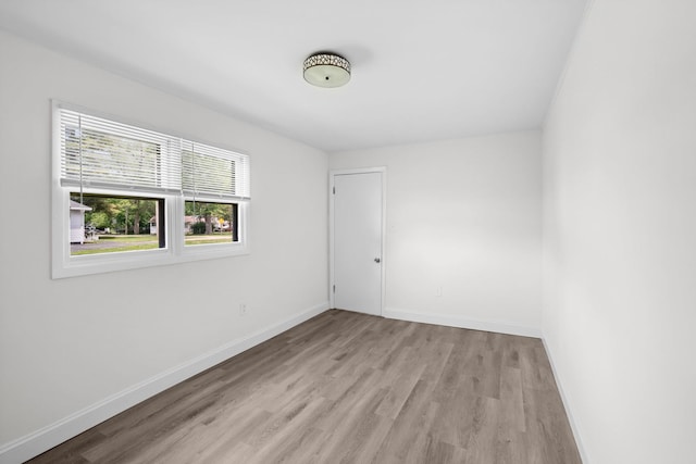 37714 N Nippersink Pl, Spring Grove, IL 60081 - spare room with wood finished floors and baseboards