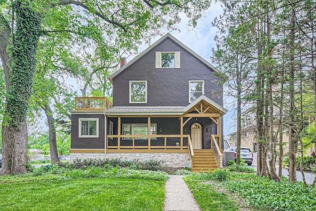9556 S Winchester Ave, Chicago, IL 60643 - view of front of property featuring a balcony, stucco siding, covered porch, and a shingled roof