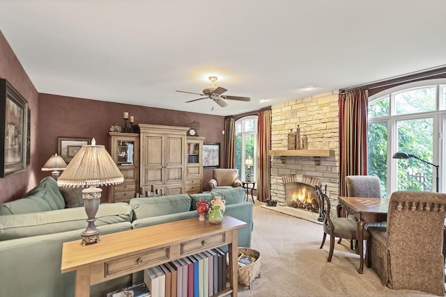 2559 Bird Ln, Batavia, IL 60510 - living area featuring light carpet, a fireplace, and a ceiling fan