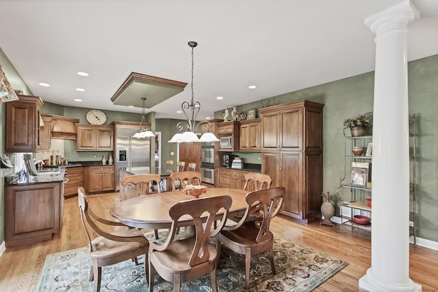 2559 Bird Ln, Batavia, IL 60510 - dining space featuring decorative columns, light wood-style floors, and recessed lighting