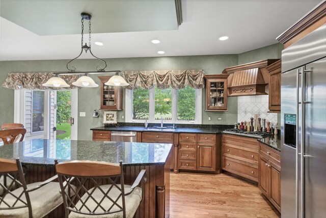 2559 Bird Ln, Batavia, IL 60510 - kitchen with stainless steel appliances, a sink, plenty of natural light, light wood-style floors, and recessed lighting