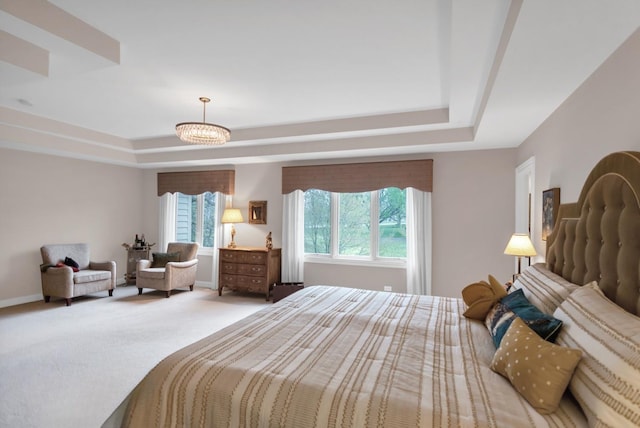 2559 Bird Ln, Batavia, IL 60510 - carpeted bedroom featuring a tray ceiling and baseboards