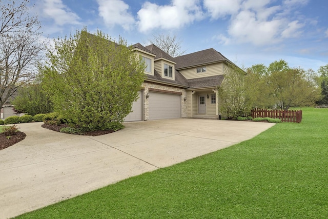 2559 Bird Ln, Batavia, IL 60510 - view of front of home with driveway, a garage, and roof with shingles