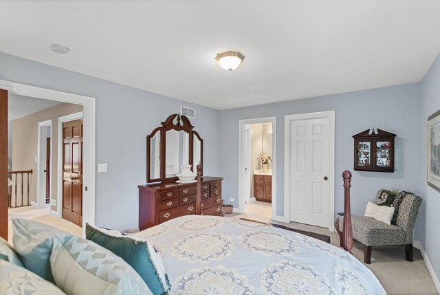 2559 Bird Ln, Batavia, IL 60510 - bedroom featuring light colored carpet, baseboards, and ensuite bathroom