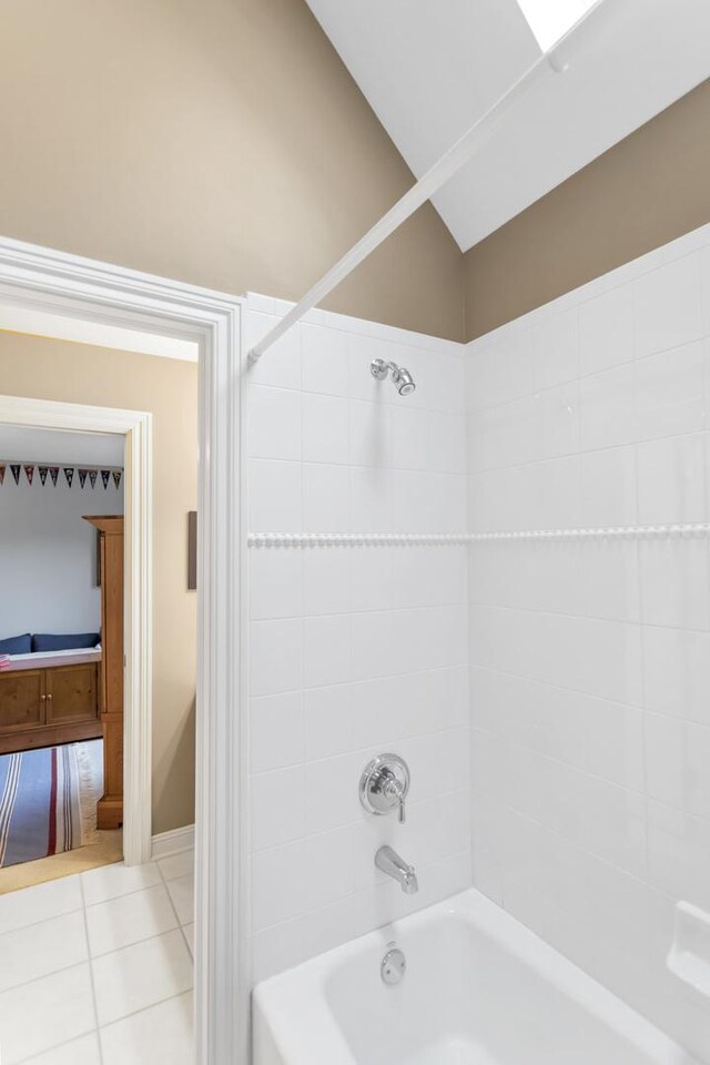2559 Bird Ln, Batavia, IL 60510 - full bath with washtub / shower combination, tile patterned flooring, ensuite bathroom, and lofted ceiling