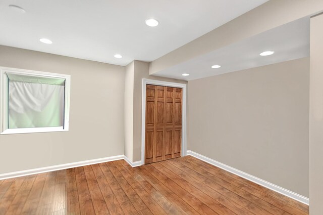 2559 Bird Ln, Batavia, IL 60510 - unfurnished bedroom with baseboards, light wood-style flooring, a closet, and recessed lighting