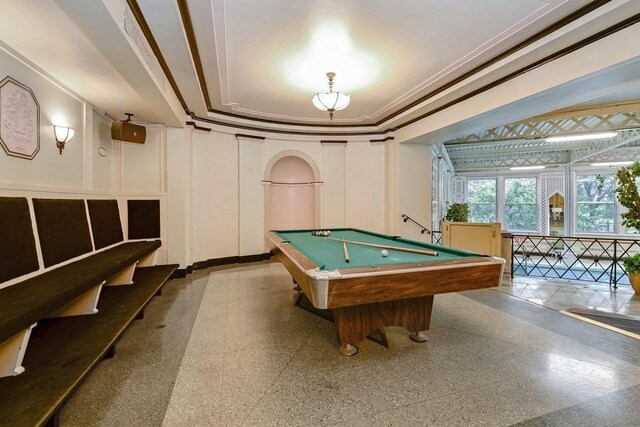 5555 N Sheridan Rd Unit 309, Chicago, IL 60640 - recreation room featuring a decorative wall, crown molding, and billiards table
