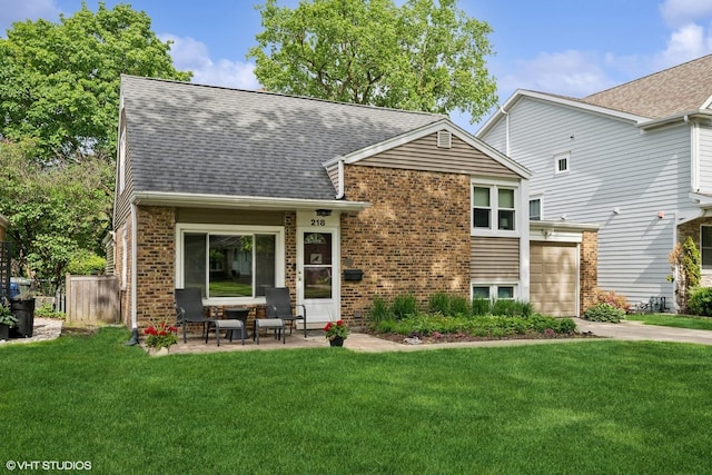 218 S Owen St, Mount Prospect, IL 60056 - rear view of property with brick siding, a shingled roof, a garage, and a patio area