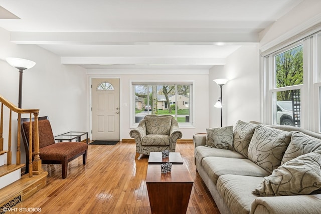218 S Owen St, Mount Prospect, IL 60056 - living room featuring beamed ceiling, stairs, and light wood finished floors