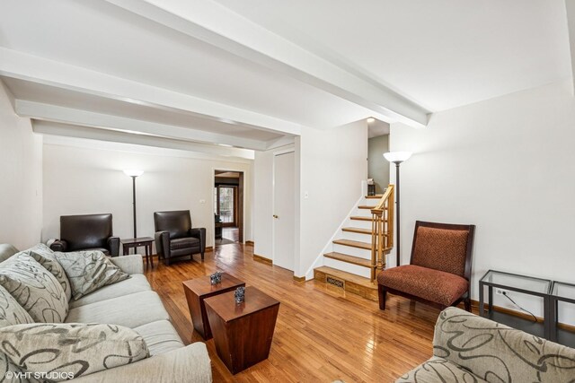218 S Owen St, Mount Prospect, IL 60056 - living room featuring beam ceiling, stairway, and wood finished floors