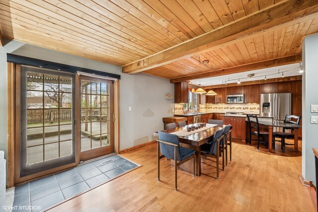 218 S Owen St, Mount Prospect, IL 60056 - dining area featuring a wooden ceiling with exposed beams, light wood finished floors, and rail lighting