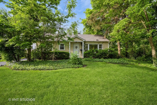 1731 Maple Ave, Northbrook, IL 60062 - view of front of house with a front lawn