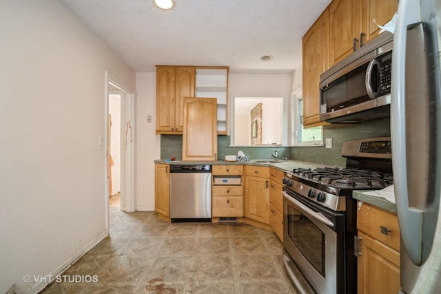 1731 Maple Ave, Northbrook, IL 60062 - kitchen with appliances with stainless steel finishes and tasteful backsplash