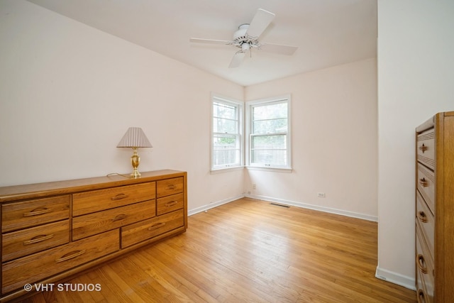 1731 Maple Ave, Northbrook, IL 60062 - bedroom featuring light wood-style flooring and ceiling fan