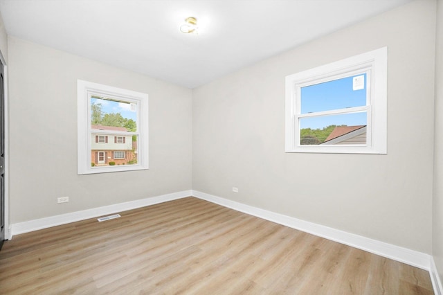 179 Glen Hill Dr, Glendale Heights, IL 60139 - unfurnished room with light wood finished floors and baseboards