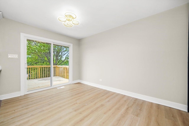 179 Glen Hill Dr, Glendale Heights, IL 60139 - unfurnished room featuring wood finished floors and baseboards