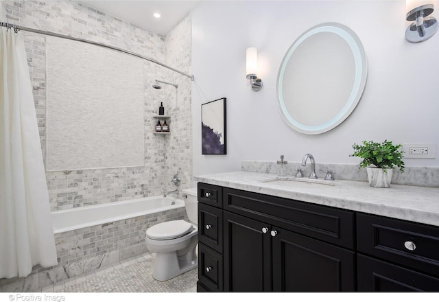 2015 N Howe St, Chicago, IL 60614 - full bathroom featuring tiled shower / bath, vanity, toilet, tile patterned floors, and recessed lighting