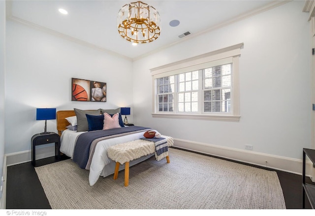 2015 N Howe St, Chicago, IL 60614 - bedroom with baseboards, crown molding, wood finished floors, a chandelier, and recessed lighting