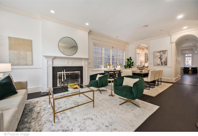 2015 N Howe St, Chicago, IL 60614 - living room with arched walkways, crown molding, baseboards, wood finished floors, and recessed lighting