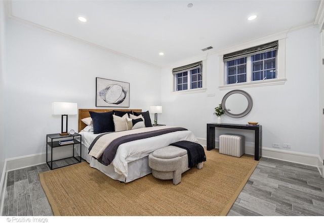 2015 N Howe St, Chicago, IL 60614 - bedroom with wood finished floors, baseboards, crown molding, and recessed lighting
