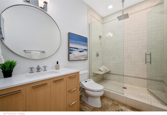 2015 N Howe St, Chicago, IL 60614 - full bathroom featuring vanity, toilet, a shower stall, and recessed lighting